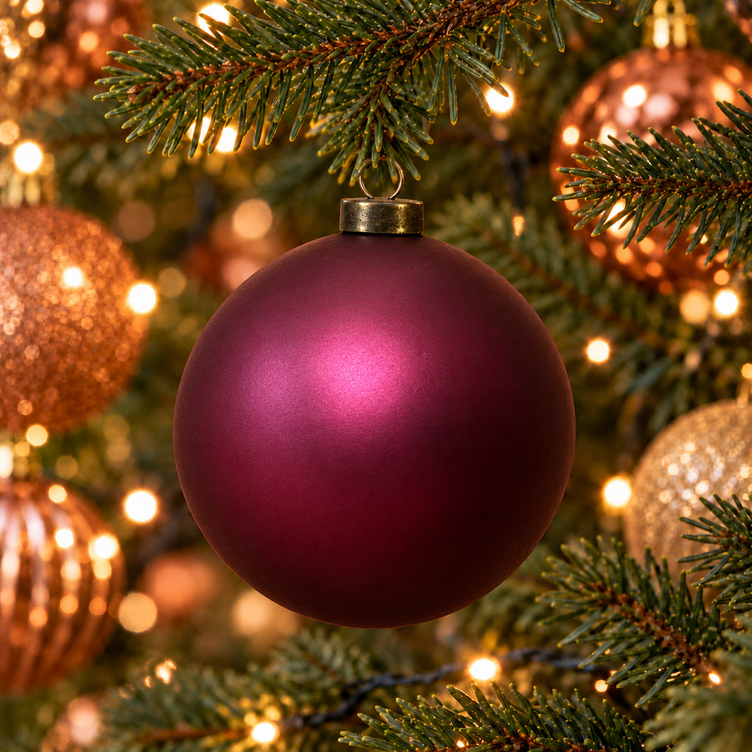 Pro Deco Collection Christmas bauble, ruby matt, 8 cm diameter, hanging in a Christmas tree with warm white lights
